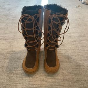 Tall tie up UGG women boots.